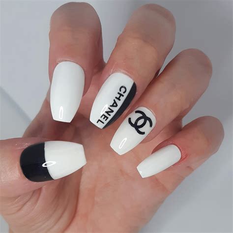 pink nails with chanel symbol|timeless chanel nail designs.